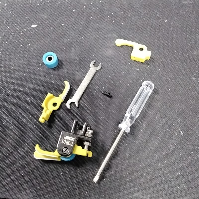 PIEDINO CON ROTELLA 1/16 L-2 + ACC. (TEFLON)